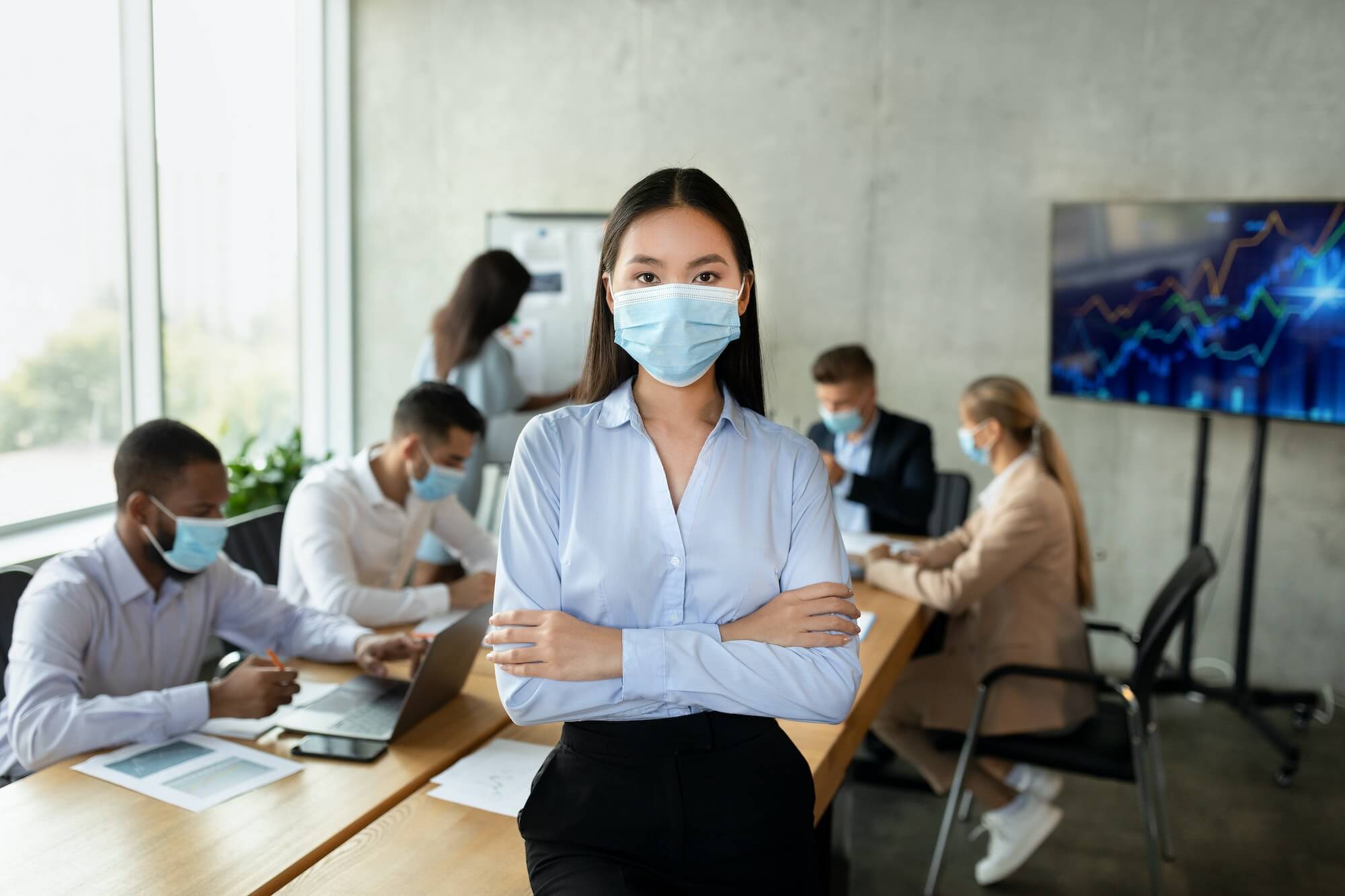 covid 19 and entrepreneurship portrait of confident young asian businesswoman in medical mask